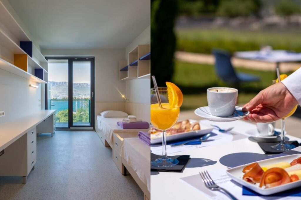 soba iznutra s dva kreveta i pogledom na more, doručak na stolu uz zelenilo